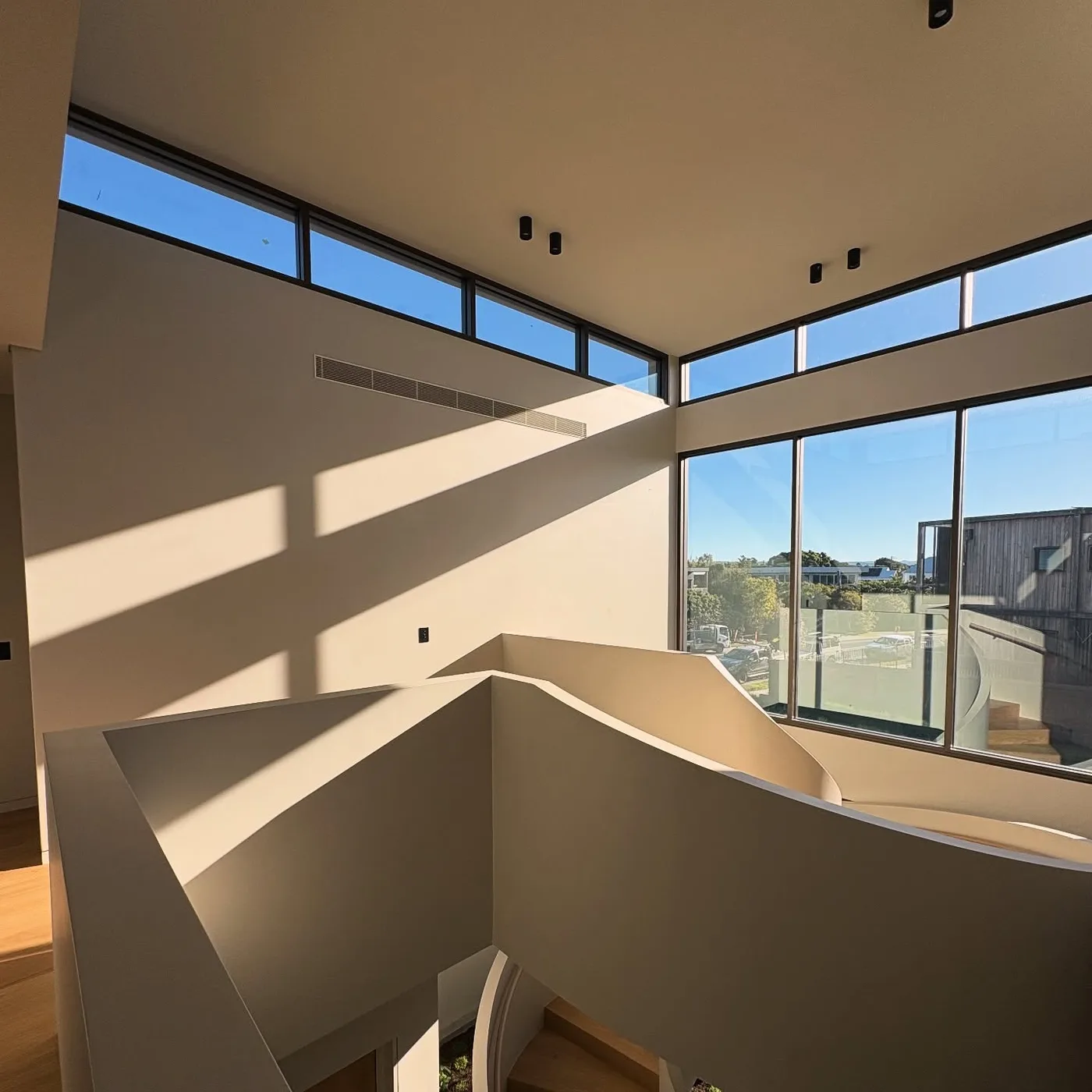 Sculptural white interior with clerestory windows