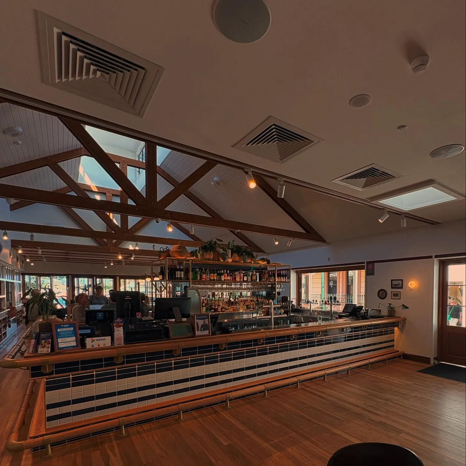 Hotel dining room with exposed timber trusses