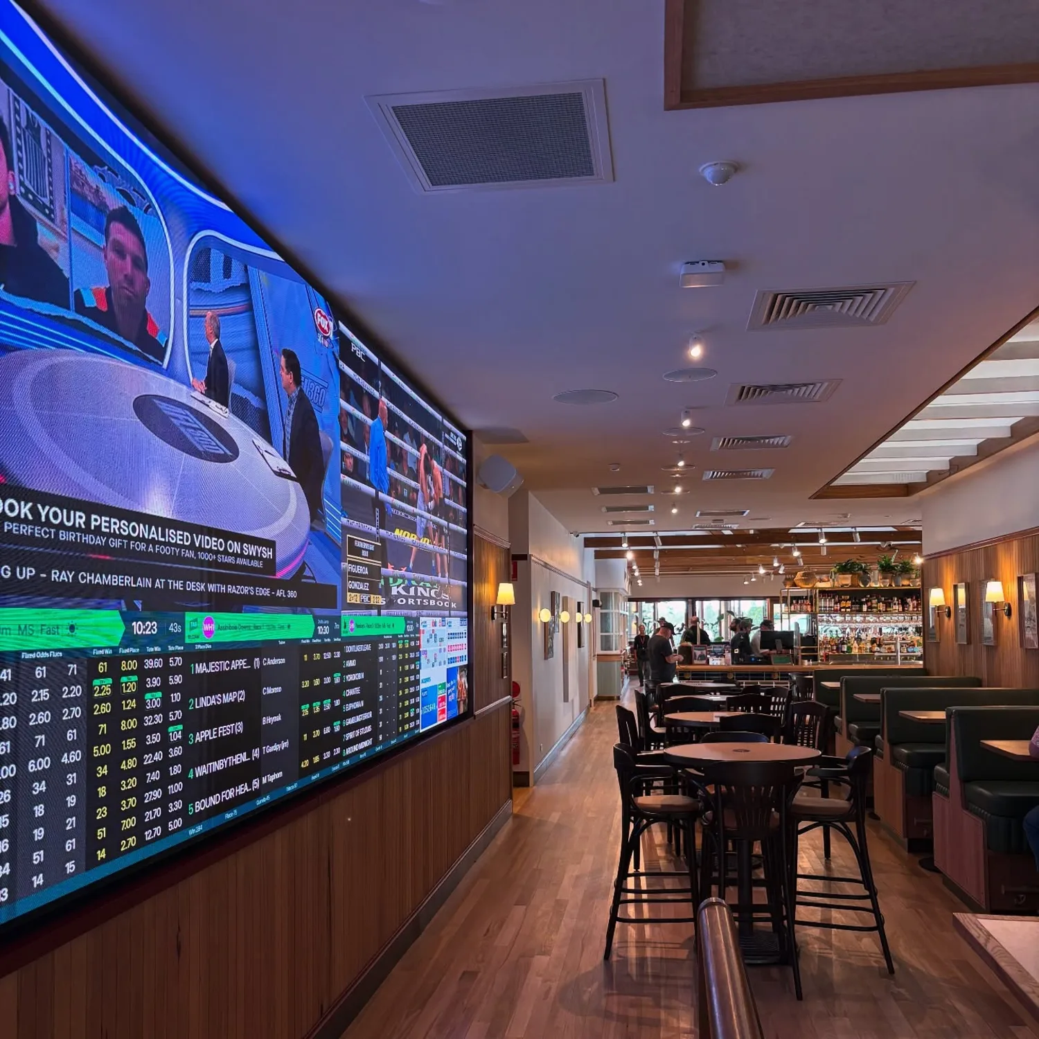 Sports bar with a large screen wall